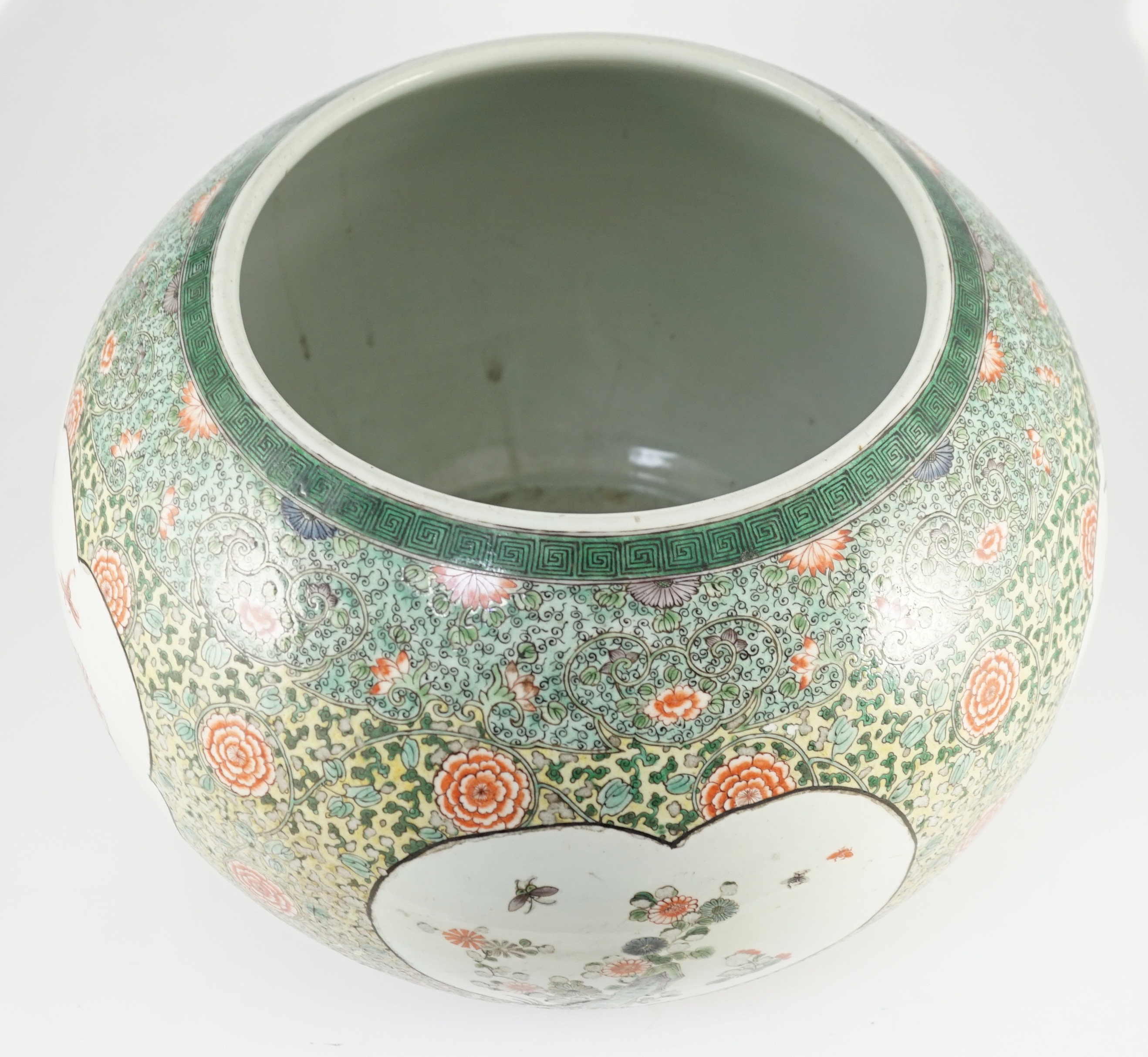 A large Chinese famille verte jardiniere or fish bowl, 19th century, 44cm diameter, 30.5cm high, flaking to green enamel